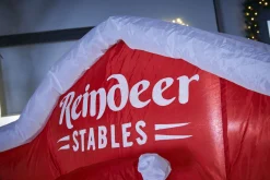 WeRChristmas Inflatables^Pre-Lit Inflatable Santa & Reindeer Stables, 8.5 Ft